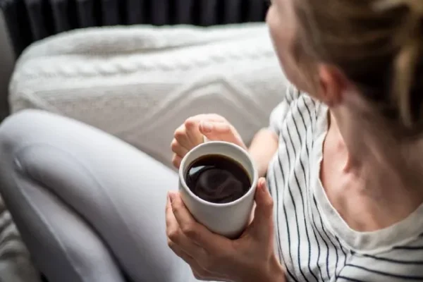 What time is the most beneficial time for the body to drink coffee?